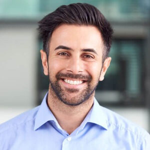 imgi 10 portrait of smiling businessman standing in lobby 3QPCMXE 300x300